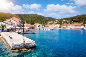 The beautiful village of Fiscardo, Kefalonia island, Greece, with the marina for sailboats and yachts during summer time