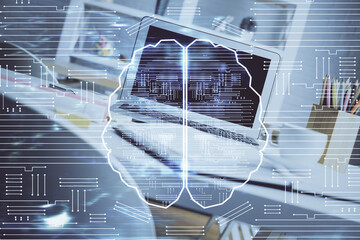 Double exposure of work space with computer and human brain drawing hologram. Brainstorm concept.