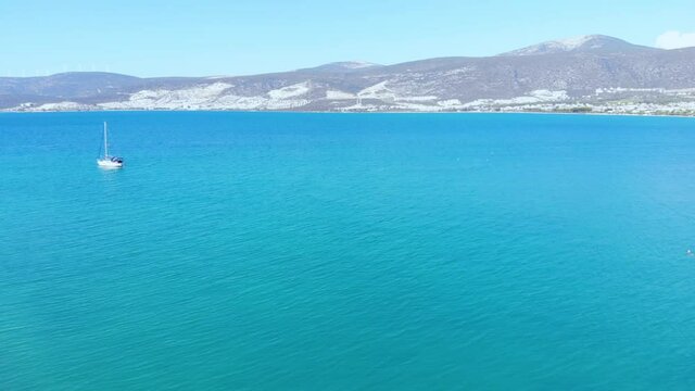 Aerial nature landscape of secret bay of Aegean Sea where green and blue meets. Pure nature with incredible clear green waters on a summer day in Didim, Turkey