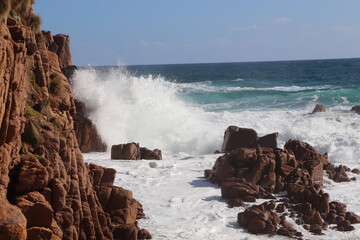 waves breaking on rocks