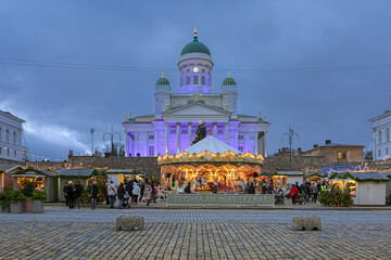 Helsinki, Finland. Christmas market at the Senate Square in front of the Helsinki Cathedral in...