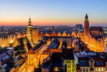 Naklejka premium Sightseeing of Poland. Cityscape of Wroclaw, beautiful aerial night view. 