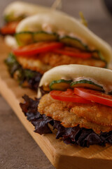 Steamed wheat bun dressed with designer sauce. Vietnamese cuisine concept. Still life. Close-up.