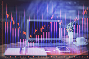 Financial chart drawing and table with computer on background. Multi exposure. Concept of international markets.