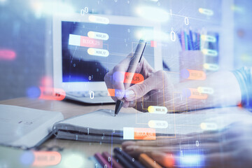 Double exposure of woman's hands on background with technology and digital coding icons. Data development concept. Close up.