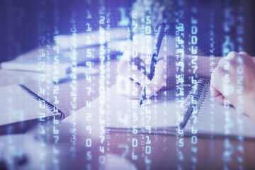 Double exposure of hands making notes background with technology and digital coding huds. Data learning concept.