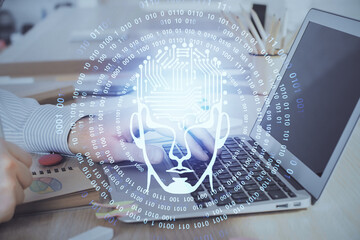 Man typing on keyboard background with brain hologram. Concept of big Data. Double exposure.
