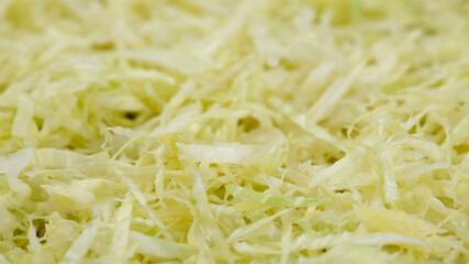 superfoods capsule moringa or spirulina in black spoon and powder on black stone