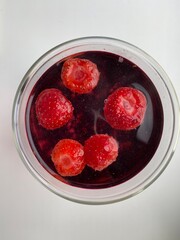 Fruit tea with strawberries and currants