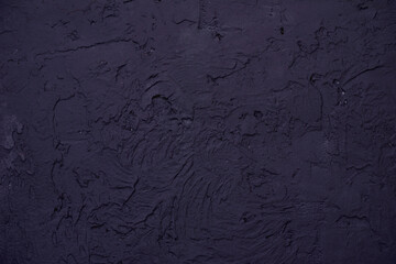 Background made with a texture of a black wall