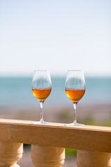 Beautiful scene with wine glasses standing alone