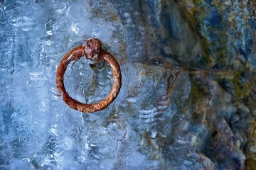 one iron ring on a stone rock