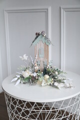 Cristmass decoration  with house on the table