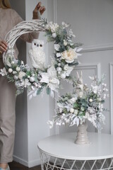 Cristmass decoration  with owl in hands 