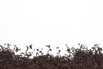 Dry tea leaves on white background. Place for text