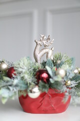 Cristmass decoration  with deer and pine on hands