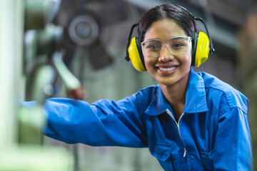 portrait asian female Professional engineering wearing uniform and safety goggles Quality control,...