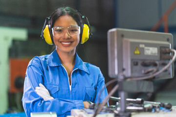 portrait asian female Professional engineering wearing uniform and safety goggles Quality control, maintenance, check in factory, warehouse Workshop for factory operators - Powered by Adobe