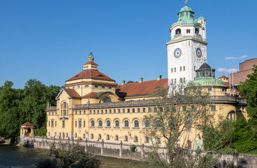 Fototapeta na wymiar Cityscape of Muellersches Volksbad on Isar river bank in Munich, Germany
