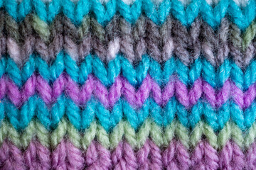 Fototapeta na wymiar close up of colorful wool hand knit texture background 