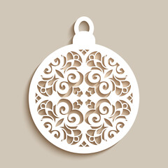 Fototapeta premium Christmas ornament with curly stencil pattern on neutral background, Xmas bauble with lace texture, cutout paper round decoration, template for cutting