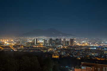 Fototapeta na wymiar Night View of Naples city and Mount Vesuvius from the panoramic road. Italy