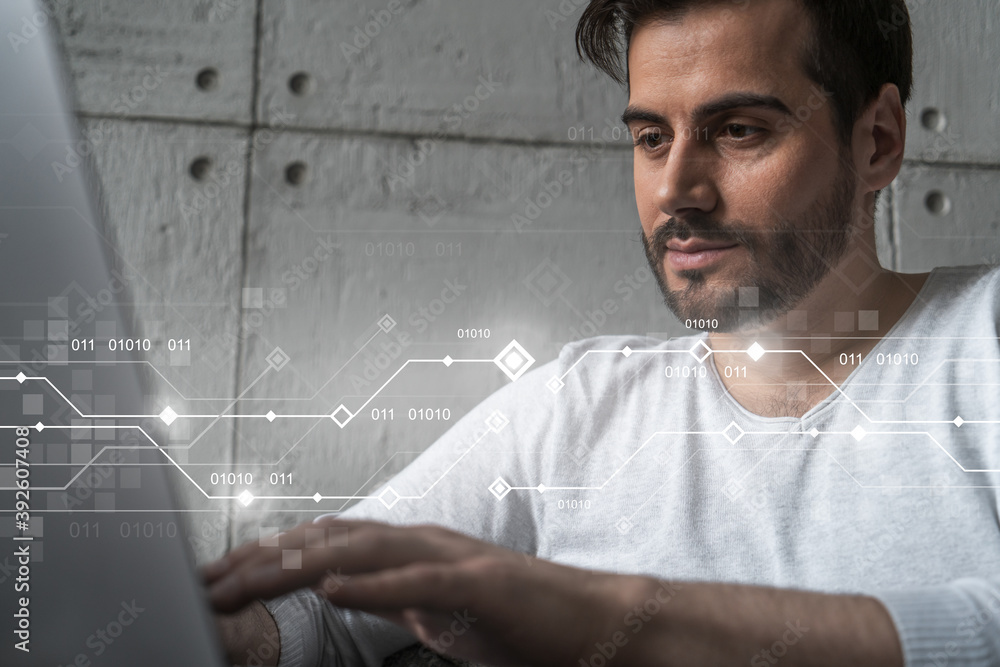 Poster a serious caucasian man in casual wears, typing laptop to create a new developers code for app. doub