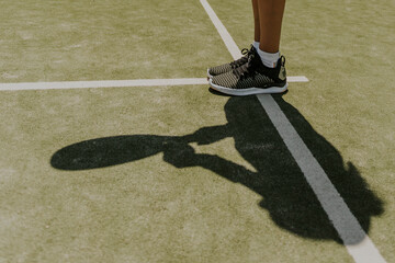 paddle deporte piernas y sombra