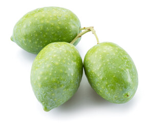 Three green natural olives isolated on a white background.