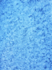 Fototapeta na wymiar Snow crystals form beautiful snow pattern on frozen icy river. Snowflake background.