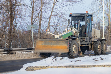 Road equipment. Tractor for cleaning roads.