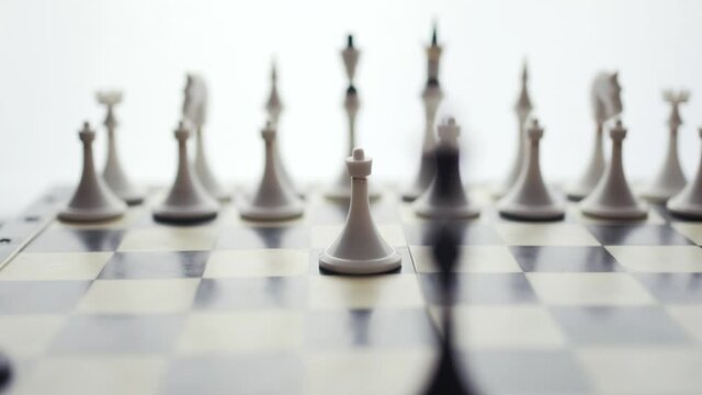 Focus on a chess piece. Chess Queen vs pawn