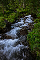 Obraz premium Waterfall with variations and a river