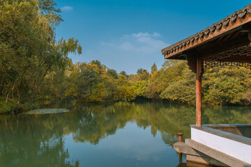 Fototapeta premium Chinese pavilion at the West lake in Hangzhou, China, autumn time.