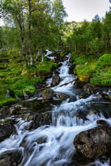 Obraz premium Waterfall with variations and a river