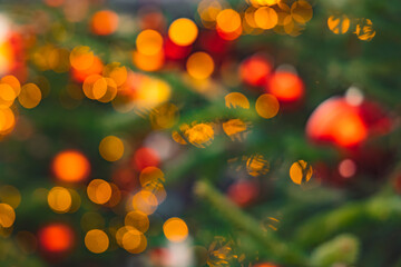 Christmas abstract picture yellow and orange lamps garland illumination lighting unfocused effect bokeh concept picture December winter holidays
