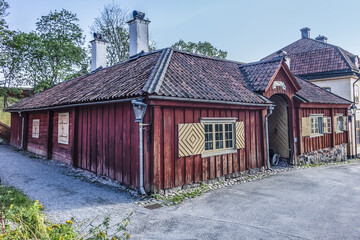 Fototapeta na wymiar Traditional architecture of old Swedish building at Djurgarden island, historic recreational area. Stockholm, Sweden.
