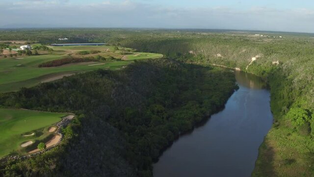 Sunlight over Chavon river and Dye Fore golf course club. Dominican Republic