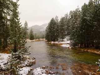 Aiguamog river surrounded by the first snow