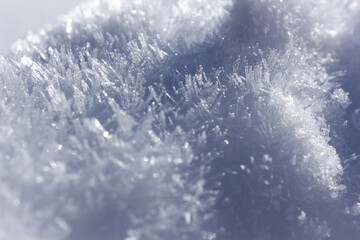 Close- up of Frozen snowflake particles with selective focus in the Austrian mountains during wintertime