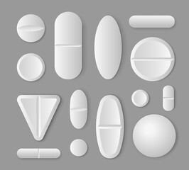 Set of medical white tablets. Realistic pills with shadow are isolated on gray background. Top view. Vector
