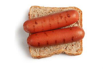 Two sausages on slices of bread on a white background.
