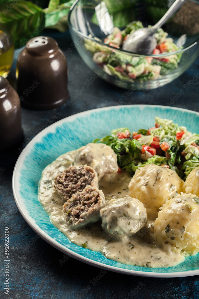 Poster Meatballs with creamy and cheese gravy served with mashed potatoes