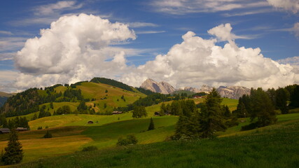 Fototapeta premium Landscape with mountains and clouds. Alpe di Siusi. South Tirol - Italy