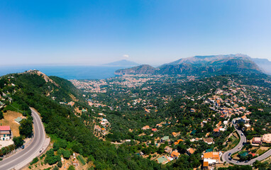 Aerial daytime view of Sorrento coast, Italy. Streets of city with hotels and restaurants are...