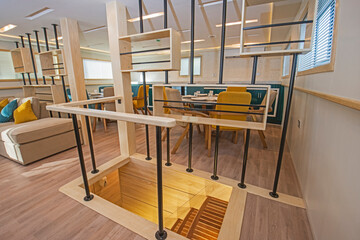 Interior of large salon area of luxury motor yacht