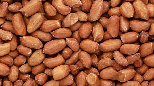 Peeled peanuts - background. Peeled nuts, close-up.