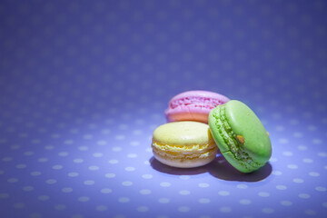 colorful macaroons isolated polka dots background