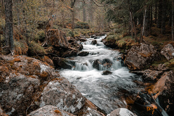 Stream of a creek with cascades