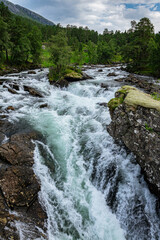 Fototapeta premium Huge waterfall with its river